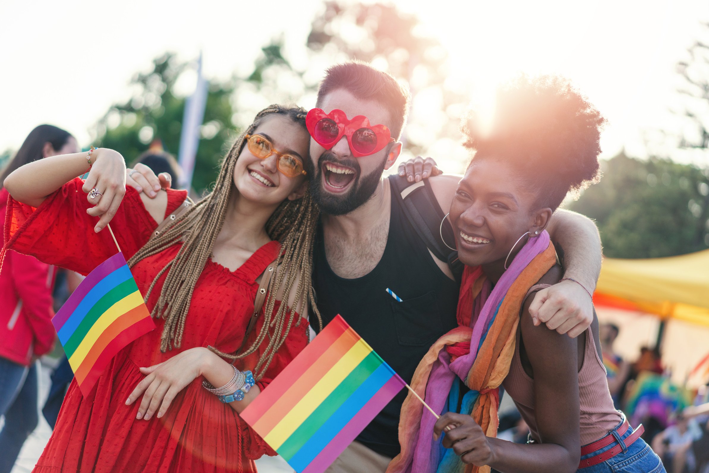 Young happy people meeting at the pride festival